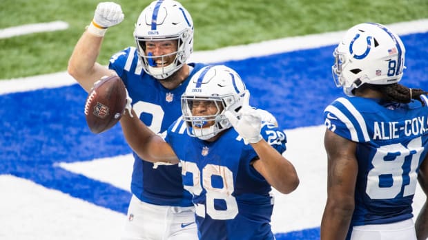 Indianapolis Colts rookie running back Jonathan Taylor celebrates a touchdown run in Sunday's 36-7 home rout of the New York Jets.